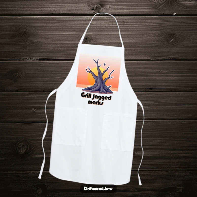 Funny apron depicting a stylized, jagged silhouette of driftwood against a gradient sunset background, suitable for kitchen creativity.