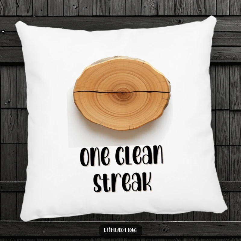 Funny pillow with a smooth, polished driftwood texture and a single, bold, dark line, adding minimalist art and humor to any couch.