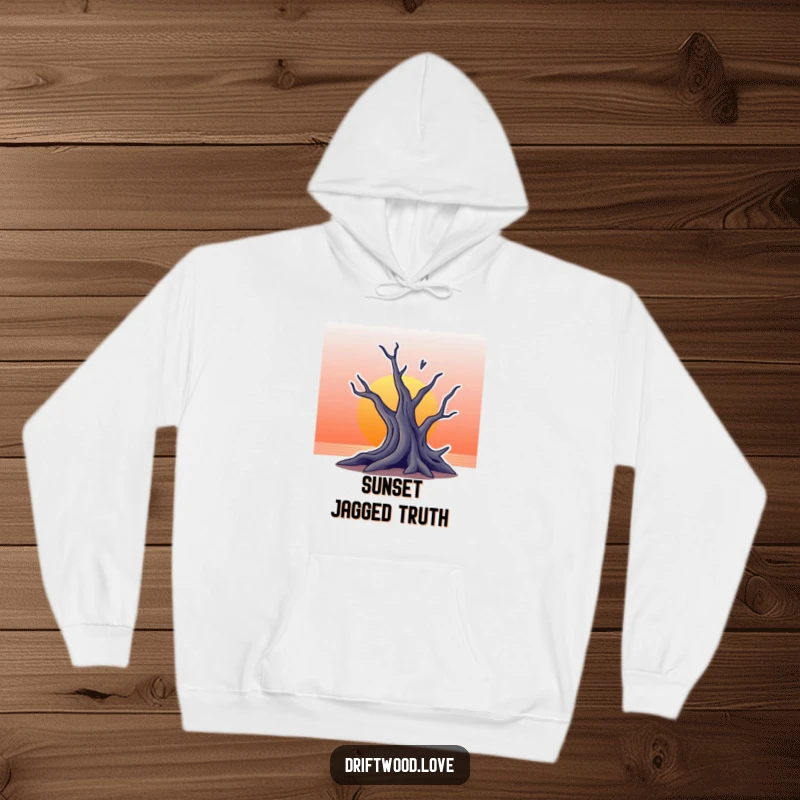 Funny hoodie showcasing a jagged silhouette of driftwood against a picturesque gradient sunset, offering warmth and artistic inspiration.