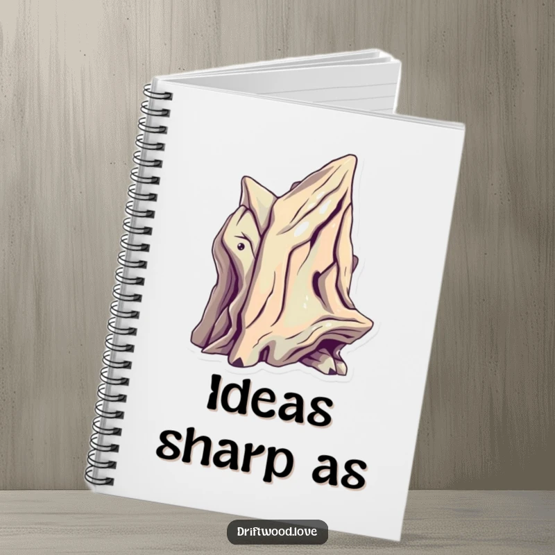 Funny Design Notebook with a sculptural driftwood piece featuring sharp, futuristic angles and metallic highlights, perfect for sketching and notes.
